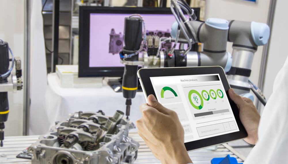 Operator tablet showing machine OEE dashboards on a mechanical components production line